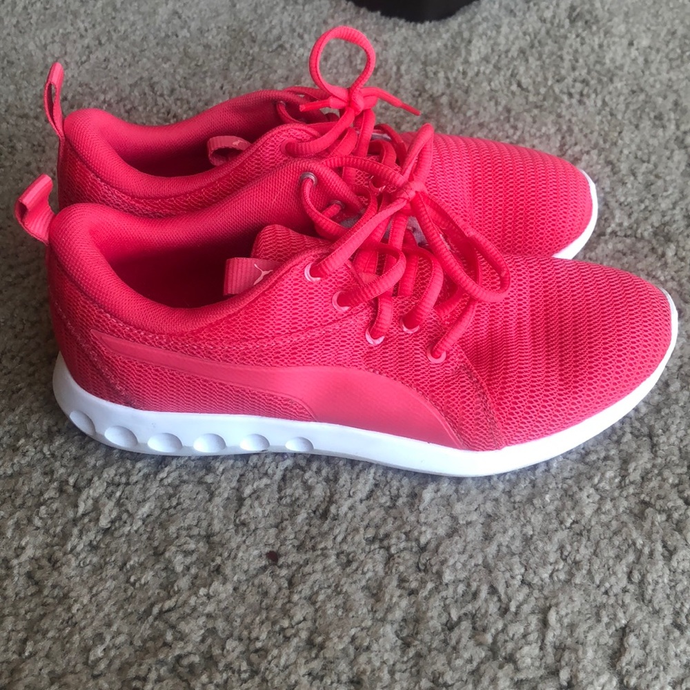 Pink puma tennis shoes